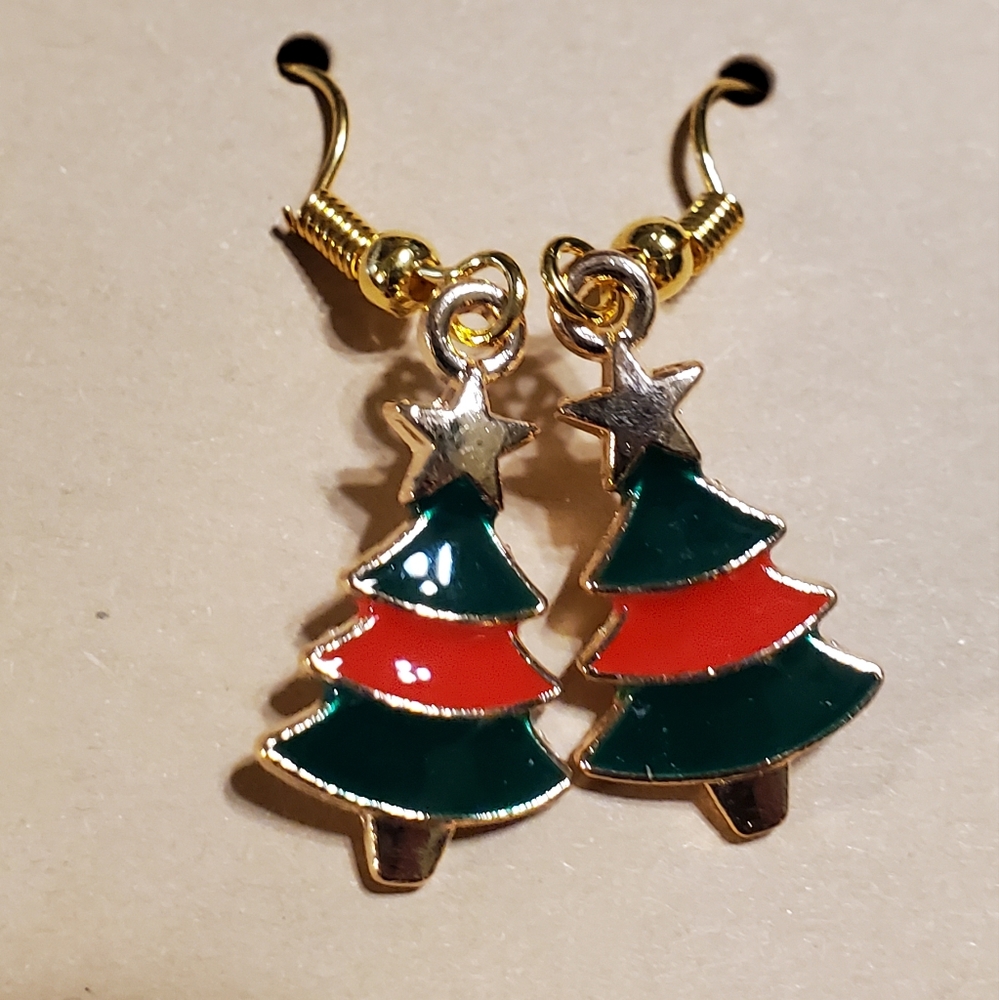 Dainty red and green Christmas tree topped with a gold star.
